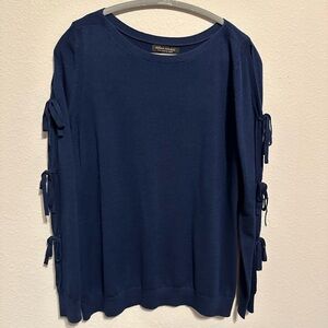 Gently worn navy summer weight sweater with open and tied sleeves. Size L.